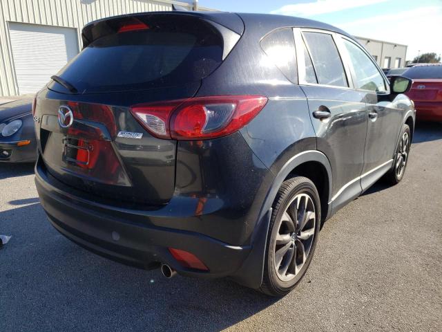 Photo 4 from auction – 2016 MAZDA CX-5 GT with VIN JM3KE2DY3G0676899