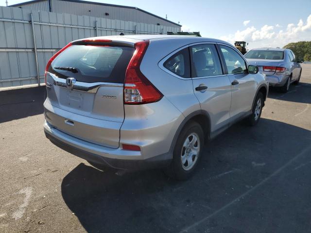 Photo 4 from auction – 2016 HONDA CR-V LX with VIN 5J6RM4H36GL000282