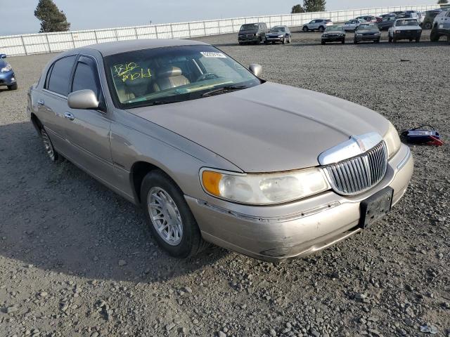 LINCOLN TOWN CAR E 2000 with VIN 1LNHM81W7YY884441 - Photo from auction
