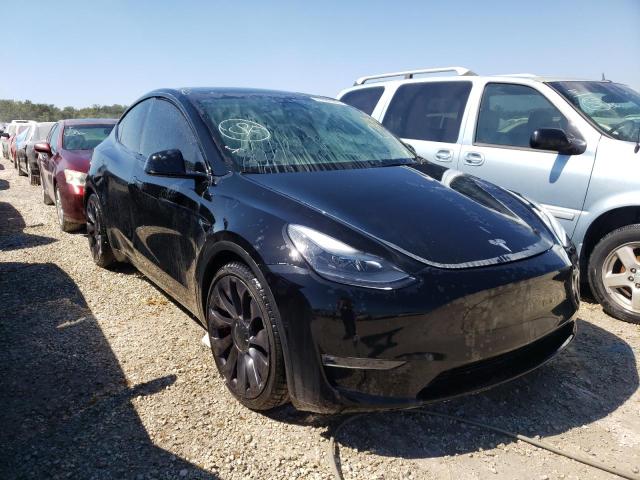 TESLA MODEL Y 2022 with VIN 7SAYGDEF9NF307228 - Photo from auction