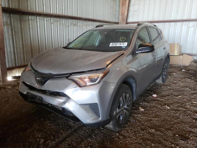 Photo 2 from auction – 2018 TOYOTA RAV4 LE with VIN 2T3ZFREV0JW444698