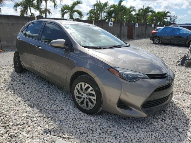 TOYOTA COROLLA L 2019 with VIN 2T1BURHE2KC187302 - Photo from auction