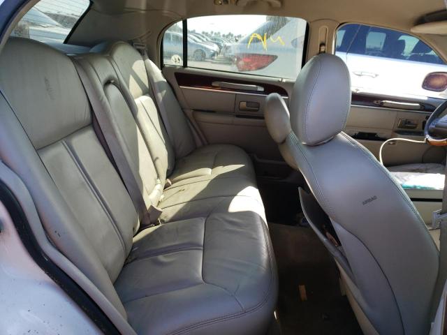 Photo 6 from auction – 2004 LINCOLN TOWN CAR U with VIN 1LNHM83W14Y680418