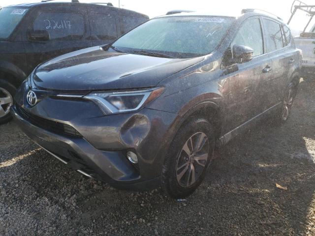 Photo 2 from auction – 2016 TOYOTA RAV4 XLE with VIN 2T3WFREV5GW261244