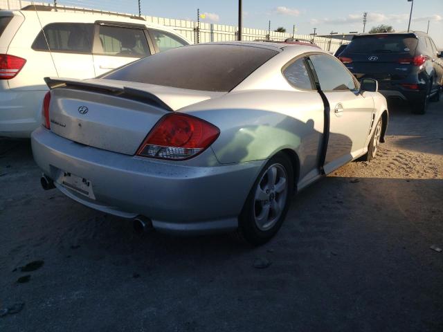 Photo 4 from auction – 2005 HYUNDAI TIBURON with VIN KMHHM65D05U168545
