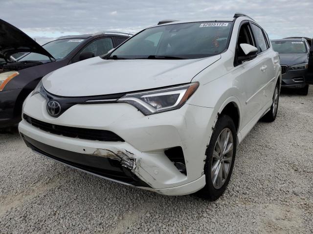 Photo 2 from auction – 2018 TOYOTA RAV4 LIMIT with VIN 2T3YFREV5JW461525