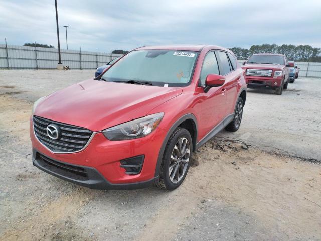 Photo 2 from auction – 2016 MAZDA CX-5 GT with VIN JM3KE4DY5G0795811