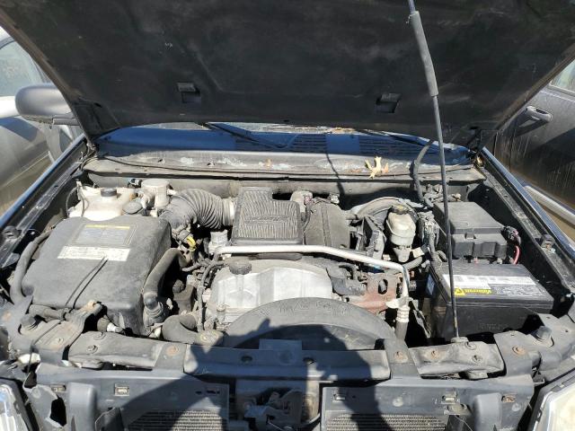 Photo 7 from auction – 2006 GMC ENVOY with VIN 1GKDT13S062140644