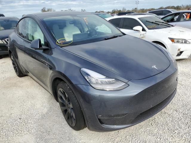 TESLA MODEL Y 2021 with VIN 5YJYGDEE4MF228715 - Photo from auction