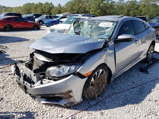 Photo 2 from auction – 2018 HONDA CIVIC EX with VIN 2HGFC2F70JH572881