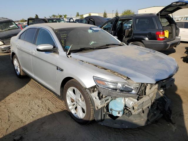 FORD TAURUS SEL 2015 with VIN 1FAHP2E8XFG199802 - Photo from auction