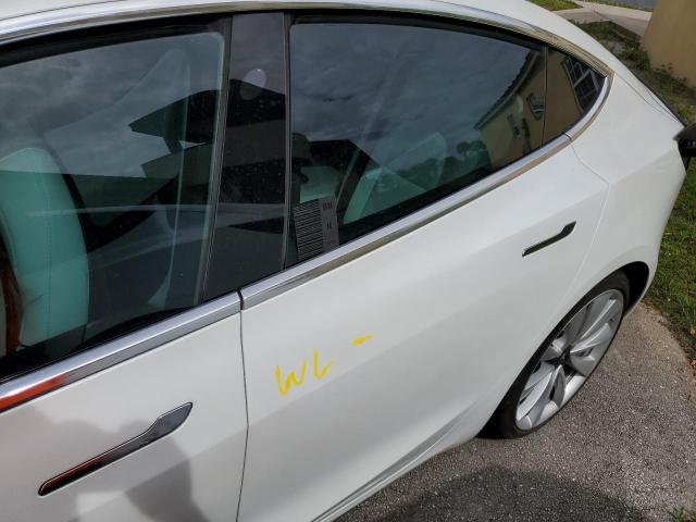 Photo 9 from auction – 2019 TESLA MODEL 3 with VIN 5YJ3E1EB7KF214101