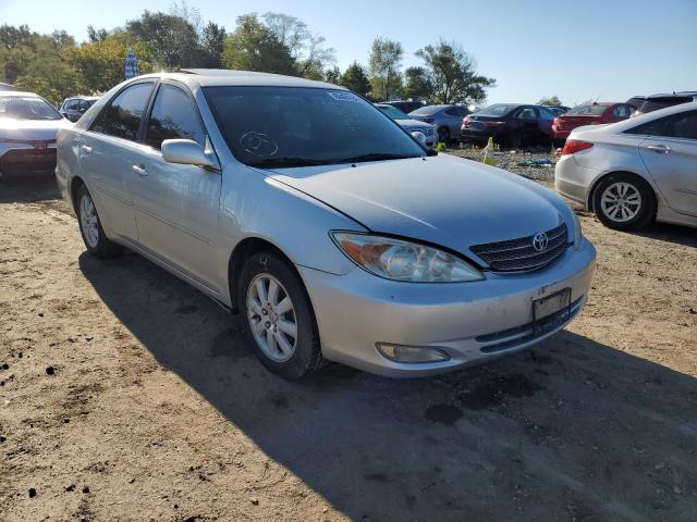 TOYOTA CAMRY LE 2004 with VIN 4T1BE30K74U280216 - Photo from auction