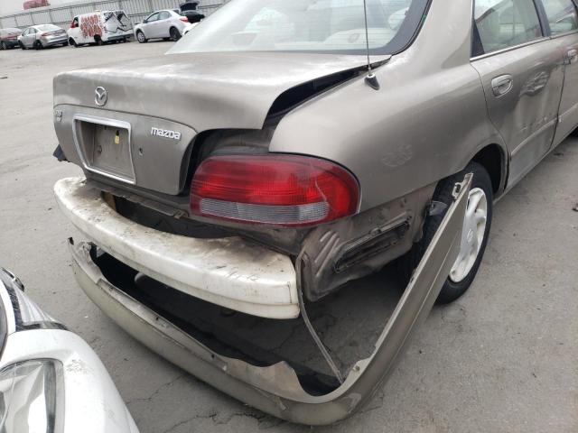 Photo 9 from auction – 1998 MAZDA 626 DX with VIN 1YVGF22C1W5740694