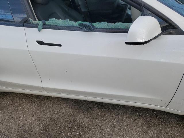 Photo 9 from auction – 2021 TESLA MODEL 3 with VIN 5YJ3E1EA6MF911608