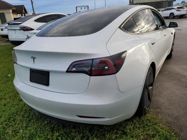 Photo 4 from auction – 2021 TESLA MODEL 3 with VIN 5YJ3E1EA6MF911608