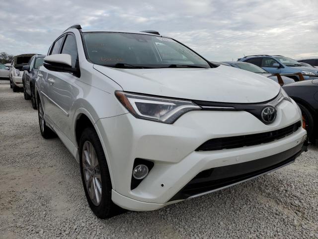 TOYOTA RAV4 LIMIT 2018 with VIN 2T3YFREV5JW461525 - Photo from auction