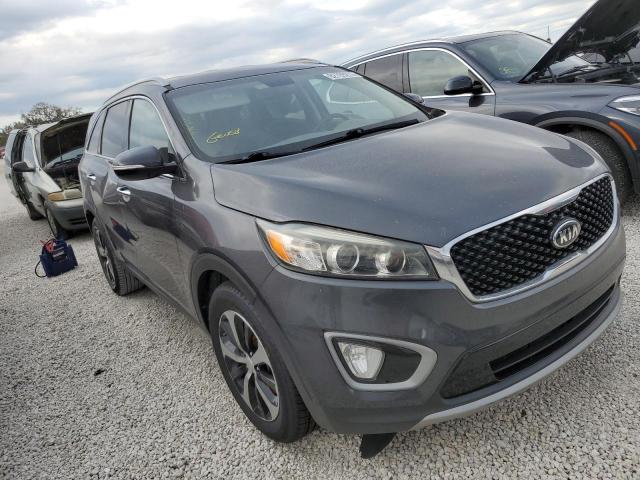 KIA SORENTO EX 2016 with VIN 5XYPH4A19GG040023 - Photo from auction