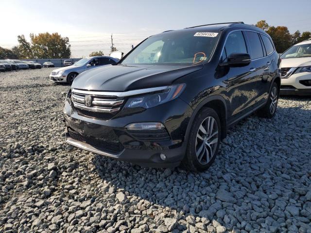 Photo 2 from auction – 2016 HONDA PILOT TOUR with VIN 5FNYF6H91GB092903