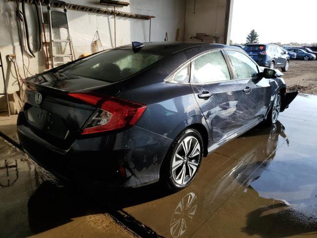 Photo 4 from auction – 2017 HONDA CIVIC EXL with VIN 2HGFC1F77HH646432