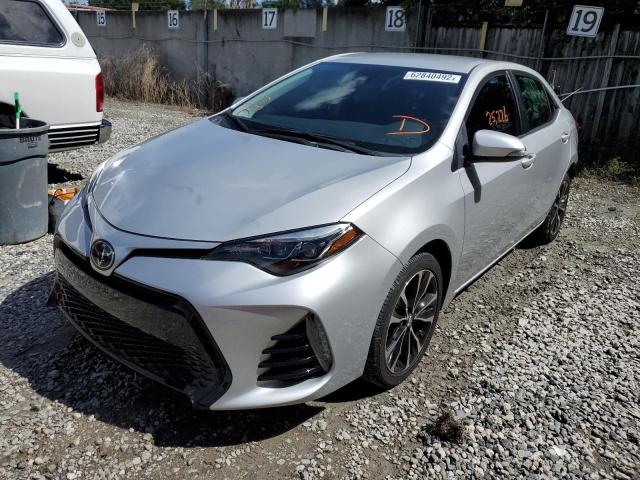 Photo 2 from auction – 2018 TOYOTA COROLLA L with VIN 5YFBURHE4JP789245