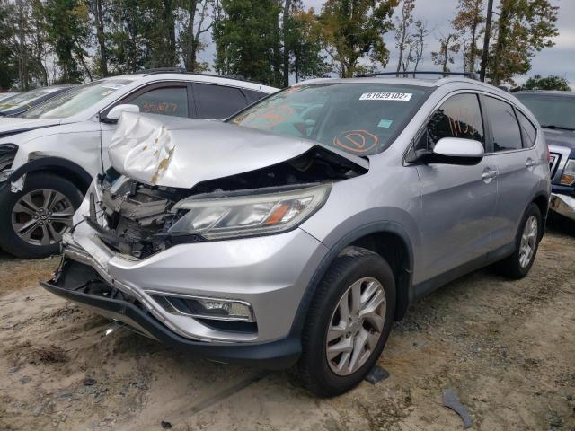 Photo 2 from auction – 2015 HONDA CR-V EX with VIN 2HKRM3H50FH525293