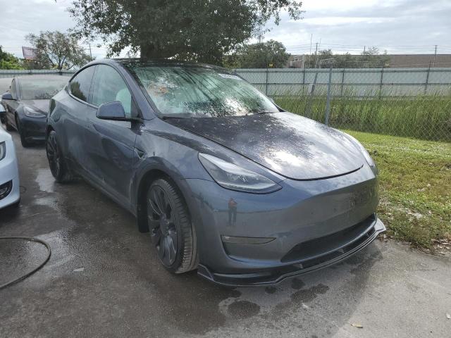 TESLA MODEL Y 2022 with VIN 7SAYGDEF6NF379746 - Photo from auction