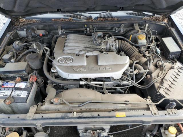Photo 7 from auction – 2002 INFINITI QX4 with VIN JNRDR09Y32W253538
