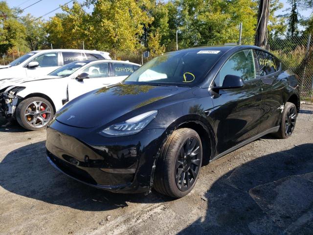 Photo 2 from auction – 2021 TESLA MODEL Y with VIN 5YJYGDEE0MF297109