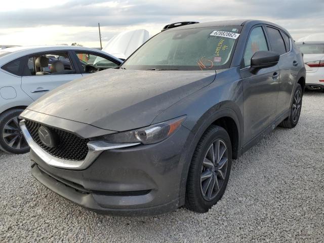 Photo 2 from auction – 2018 MAZDA CX-5 TOURI with VIN JM3KFACM3J1464995