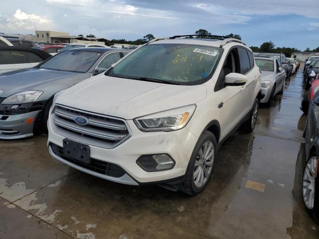 Photo 2 from auction – 2017 FORD ESCAPE TIT with VIN 1FMCU9JD0HUC16860