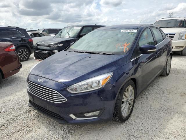 Photo 2 from auction – 2016 FORD FOCUS TITA with VIN 1FADP3J22GL376938