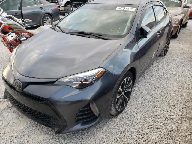 Photo 2 from auction – 2018 TOYOTA COROLLA L with VIN 5YFBURHE9JP778693