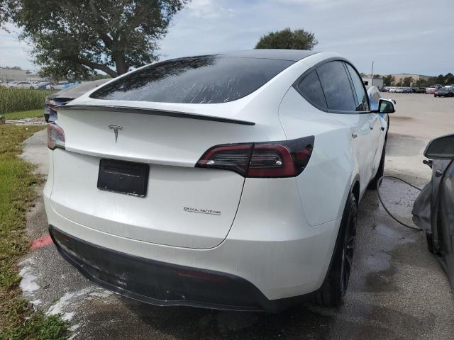 Photo 4 from auction – 2022 TESLA MODEL Y with VIN 7SAYGDEF5NF506292