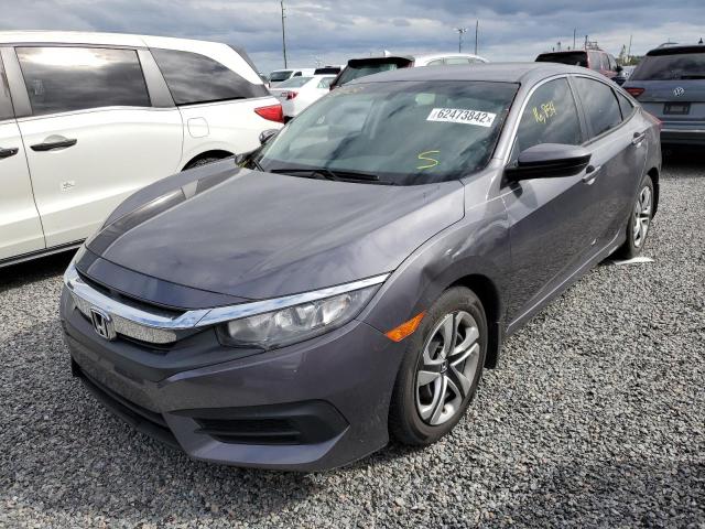 Photo 2 from auction – 2018 HONDA CIVIC LX with VIN 2HGFC2F59JH596353
