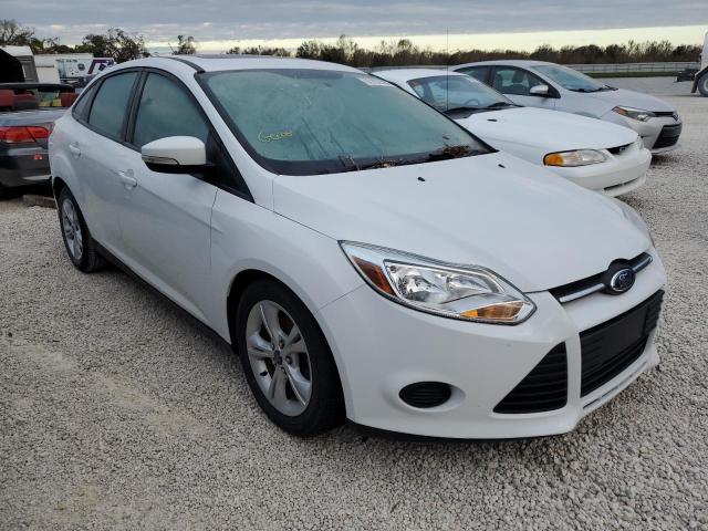 FORD FOCUS SE 2014 with VIN 1FADP3F21EL458259 - Photo from auction