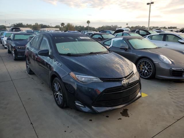 TOYOTA COROLLA L 2017 with VIN 2T1BURHE3HC882641 - Photo from auction