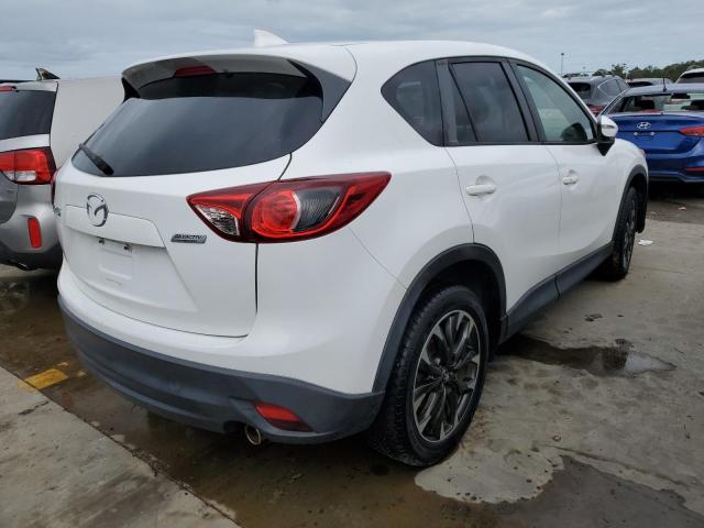 Photo 4 from auction – 2016 MAZDA CX-5 GT with VIN JM3KE2DY1G0820420
