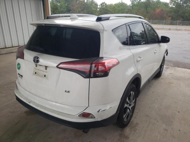 Photo 4 from auction – 2018 TOYOTA RAV4 LE with VIN JTMZFREV4JJ742914