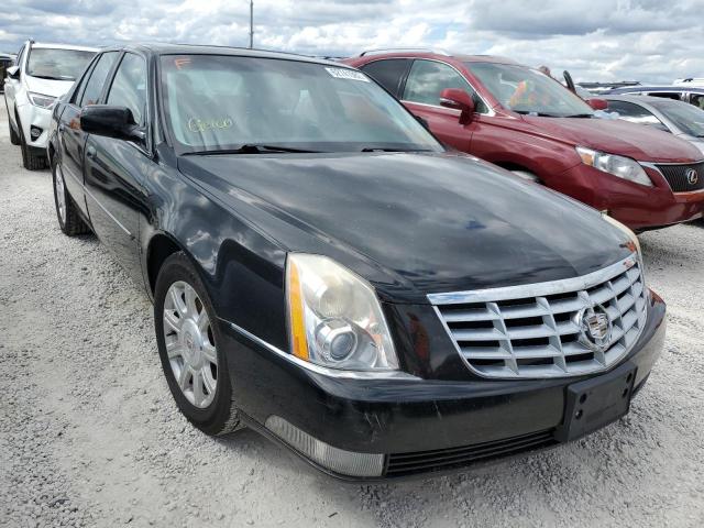 CADILLAC DTS 2010 with VIN 1G6KA5EYXAU100590 - Photo from auction