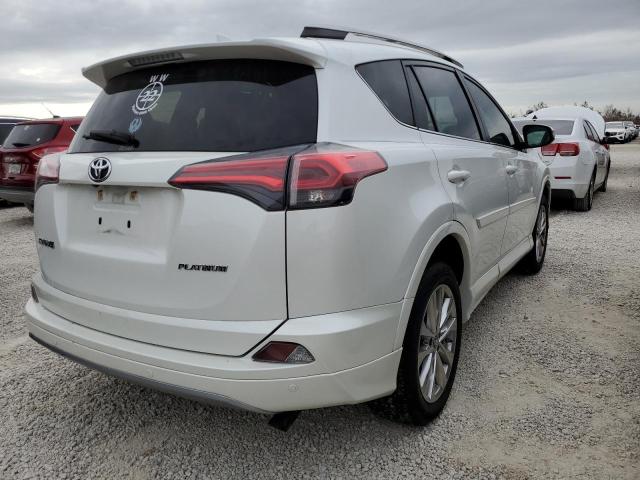 Photo 4 from auction – 2018 TOYOTA RAV4 LIMIT with VIN 2T3YFREV5JW461525