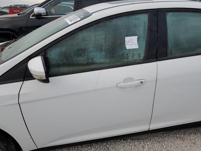 Photo 9 from auction – 2014 FORD FOCUS SE with VIN 1FADP3F21EL458259