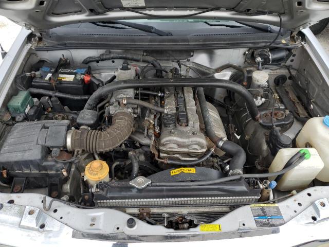 Photo 7 from auction – 2003 CHEVROLET TRACKER with VIN 2CNBE13C436915012