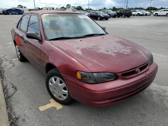 TOYOTA COROLLA VE 1999 with VIN 2T1BR12E3XC212677 - Photo from auction