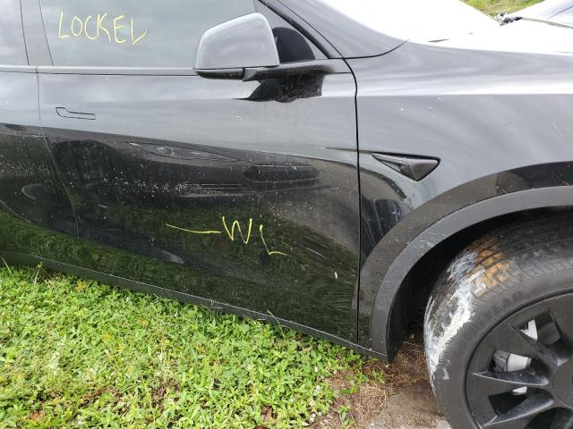 Photo 10 from auction – 2021 TESLA MODEL Y with VIN 5YJYGDEE9MF172920