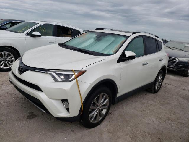 Photo 2 from auction – 2016 TOYOTA RAV4 LIMIT with VIN 2T3DFREV8GW421432