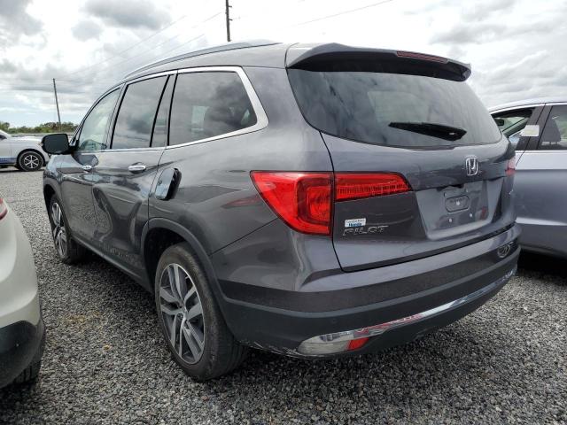 Photo 3 from auction – 2018 HONDA PILOT TOUR with VIN 5FNYF5H99JB010272