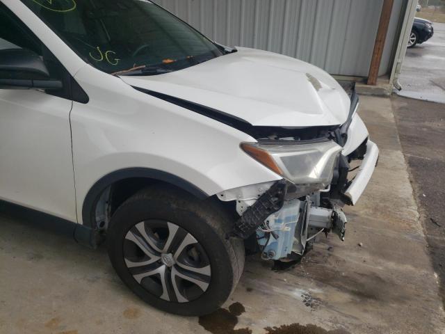 Photo 7 from auction – 2018 TOYOTA RAV4 LE with VIN JTMZFREV4JJ742914