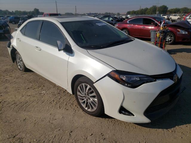 TOYOTA COROLLA LE 2017 with VIN 5YFBPRHE4HP647849 - Photo from auction