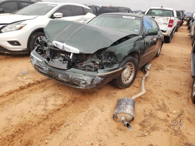 Photo 2 from auction – 2001 LINCOLN TOWN CAR E with VIN 1LNHM81W11Y738428